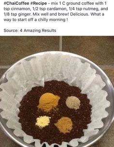 a metal bowl filled with food on top of a tiled floor