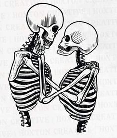 two skeletons holding each other in their arms