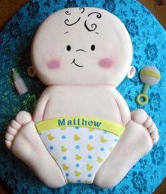 a cake that is shaped like a baby