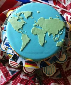 a cake decorated with the map of the world