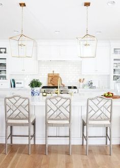 the instagram page on instagram shows two chairs in front of a kitchen island