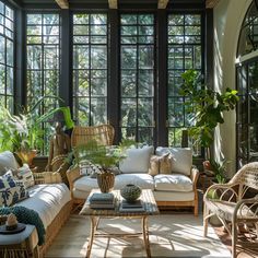 a living room filled with lots of furniture and plants on top of it's windows