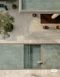 an aerial view of a living room and dining area from the top down to the floor