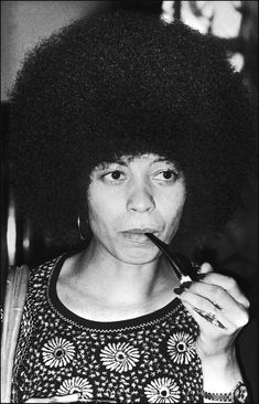 an old photo of a woman brushing her teeth