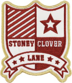 a red and white patch with the words stoney clover lane on it's side