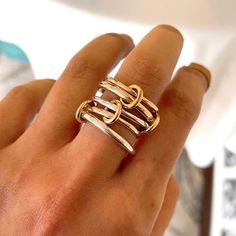 We Customized this ring for a client, now you are welcome to buy it too! Custom connected ring Round, Heavy Fit, Mother's Day Gift 14ga round gold filled 1.6mm 10ga gold filled round band 2.6mm 12ga 925 ss round band2.0mm 12ga gold filled half round band 2mm 10ga 925 ss round 2.6mm With four gold filled connected rings Please Note: Our gold filled rings may have a visible solder mark and it may be brighter than the ring as we use 14k gold for soldering. This is not a Quality Issue but limitation and nature of materials & process we use to make handmade jewelry. We gently polish our jewelry so that the 14k gold layer stays intact and the jewelry lasts longer. We are very sorry, we will NOT be able to accept any returns in this regard. Thank you for your understanding and supporting our smal Nickel Free 14k Gold Rings, Gold Sterling Silver Stackable Rings With Open Band, Nickel-free Yellow Gold Rings For Anniversary, Modern Gold Rings Nickel Free, Nickel-free Gold Stackable Rings For Anniversary, Gold Stackable Rings Nickel Free For Anniversary, Modern Hypoallergenic Rose Gold Rings, Unique Gold-colored Sterling Silver Midi Rings, Spinelli Ring