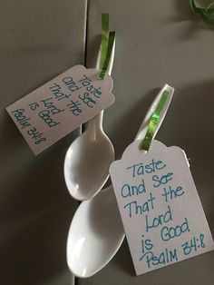 two spoons with tags attached to them that say taste and so that the lord is good