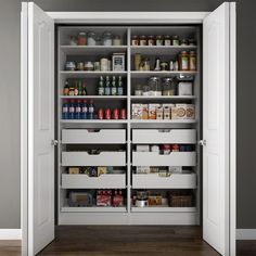 an open pantry with lots of food and drinks in it's doors, next to a hardwood floor