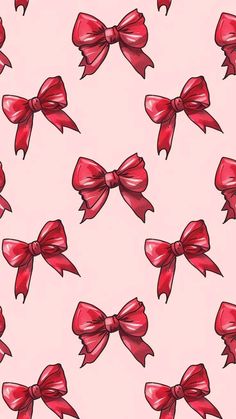 a pink background with red bows on it