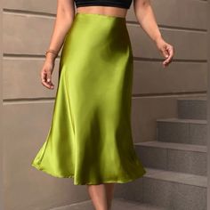 Must Have To Wear Year Round. This Satin Midi Skirt Is A Luxury Essential- Cut On The Bias To Flatter Your Curves. Pair It With A Sweaters For Comfort + Style Or Dress It Up With A Jacket. Green Satin Skirt, Elegant Midi Skirt, Bias Cut Skirt, Fishtail Dress, Satin Midi Skirt, Spring Skirts, Party Skirt, Midi Length Skirts, Mid Length Skirts