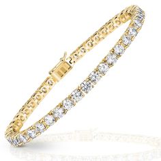 PRICES MAY VARY. Elegant and Timeless Design: Our gold bracelets for women feature round 3mm AAAA cubic zirconia stones in four-prong basket settings. This timeless design offers a blend of elegance and sophistication that enhances both professional attire and evening wear, ensuring you always look your best. High-Quality Craftsmanship: Crafted with meticulous attention to detail, this tennis bracelet is rose gold plated to ensure durability and a brilliant finish. The quality craftsmanship mean Cubic Zirconia Bracelet, Versatile Jewelry, Gold Bracelet For Women, Gold Bracelets, Professional Attire, Gold Plated Bracelets, Social Events, Bracelet For Women, Tennis Bracelet