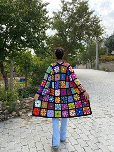 Granny square long afghan colorful cardigan is made of vibrant colors. Your crochet daisy boho cardigan, which you will love with its unique and stylish look, will be carefully made. Quality cotton threads are used in your floral jacket. Contact for different lengths. Cardigan Sizes Width 114 cm / 44.8 inches Height 105 cm / 41.3 inch **It will be produced specially according to your size** Model Size: 178 cm / 5 Feet 10.79 Inches / 63 kg - 138 lb. washing information It can be washed in the han Crochet Granny Square Patchwork Cardigan, Rainbow Granny Square Cardigan, Vintage Multicolor Patchwork Cardigan, Multicolor Retro Patchwork Cardigan, Retro Multicolor Patchwork Cardigan, Vintage Multicolor Granny Square Outerwear, Handmade Vintage Multicolor Outerwear, Handmade Multicolor Vintage Outerwear, Bohemian Multicolor Granny Square Outerwear