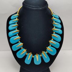 Joan Rivers Bold Blue Enameled Bib Style Collar Statement Necklace- Adjustable Necklace- Vintage Designer Estate Costume Jewelry Gift K#895 This elegant statement necklace is perfect as a gift for a classy lady. This vintage designer estate costume jewelry is from Joan Rivers and it features a bold, blue, enameled bib style collar. Its adjustable length makes it versatile and customizable. - Signed Joan Rivers on the tag - Gold tone metal - Vibrant Blue Enameled - Adjustable Necklace Length:  16 Elegant Statement Necklace, Enchanted Jewelry, Designer Costume Jewelry, Bethlehem Pa, Statement Collar Necklace, Classy Lady, Joan Rivers, Adjustable Necklace, Necklace Vintage