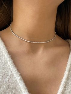 Minimalistic sterling silver choker with zirconia stones.  This choker is perfect to wear as everyday or special day jewelry.  Lightweight and minimalist. MEASUREMENT : Сhoker length is adjustable: 35-40 cm / 13,7-15,7 inches  All jewelry comes in a pretty gift box, ready to be given as a gift. Dainty Silver Tennis Necklace, Chocker Neckless, Minimalist Necklace Silver, Choker Necklace Silver, Sterling Silver Choker Necklace, Baguette Necklace, Diamond Choker Necklace, Sterling Silver Choker, Silver Choker Necklace