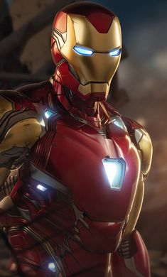 an iron man standing in the dark with his hands on his hips and glowing eyes