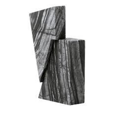 two black and white marble blocks on a white background, one is folded up to the side