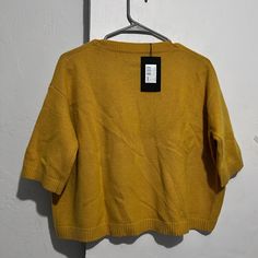 Elevate Your Wardrobe With This Beautiful Mustard Yellow Sweater From The Kooples. Crafted From High-Quality Cashmere, This Lightweight Pullover Features A Tight-Knit Pattern With Short Sleeves And A Mock Neck. Perfect For Travel, Casual Outings, Or Business Meetings, This Sweater Comes In A Regular Fit And Oversized Design, Making It Comfortable And Stylish. The Sweater Is Available In Women's Size 2 And Is Ideal For The Fall, Winter, And Spring Seasons. With Its Classic Theme And Solid Color, Mustard Cardigan, Mustard Yellow Sweater, Cardigan Oversized, Yellow Mustard, The Kooples, Yellow Sweater, Cashmere Cardigan, Classic Theme, Knit Pattern