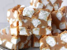 marshmallows are stacked on top of each other in the shape of squares