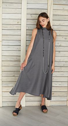 "Linen flare dress / Extravagant linen dress / Long linen summer dress / Stylish maternity dress / Linen circle loose dress / Graphite The linen flare dress is very stylish and comfortable, with two big pockets in front. In front of the dress there is triangular detail, the collar of dress with two buttons. It is made from washed and softened medium weight natural Lithuanian linen. Comfortable linen dress hand made from pre washed linen fabric. You can choose from 16 colors. (The color palette y Chic Linen Shift Dress, Lagenlook Dress For Summer Daywear, Lagenlook Summer Dress For Daywear, Summer Lagenlook Dress For Daywear, Flowy Linen A-line Dress, Linen A-line Shift Dress, Linen Shift A-line Dress, Linen Shift Dress With A-line Shape, Shift A-line Linen Dress