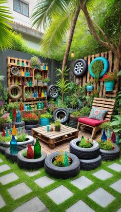 an outdoor garden with lots of potted plants and wooden pallets on the ground