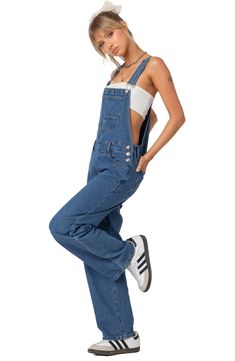 Plentiful pockets and a baggy fit up the utilitarian appeal of these classic overalls cut from nonstretch denim with a medium-wash finish. Adjustable buckle straps; side button closures Square neck Bib pockets; front scoop pockets; back patch pockets 100% cotton Machine wash, dry flat Imported Overalls Blue, Overalls Pants, Favorite Daughter, Maternity Shops, Designer Clothes For Men, Cute Simple Outfits, Denim Overalls, Back Patch, Modern Outfits