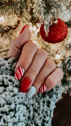 Details   • Christmas nails   • Holiday nails   • Nail design   • Gel nails   • Nails   • Nail care   • Acrylic nails   • Nail shape Christmas Nails 2022 Candy Cane, Candy Cane Nails Simple, Simple Christmas Nails Candy Cane, Easy Christmas Acrylic Nails, Red Xmas Nails Simple, Candy Cane Nail Ideas, Simple Candy Cane Nails, Easy Xmas Nails Simple