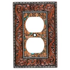 a decorative switch plate cover with an ornate design