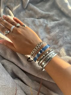 @Iwannag0t0plut0 Silver Rings Stacking, Silver Jewelry Girl, Good And Silver Jewelry Together, Silver Jewelry Bracelet Stack, Silver Jewelry Stack Bracelets, Silver Bangle Stack, Chunky Silver Bracelets, Silver Bangles Aesthetic