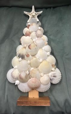 a christmas tree made out of seashells