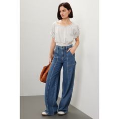 Blue denim (69% Cotton, 31% Lyocell). Jeans. Front zipper fly with button closure. 32" inseam. 11" rise. Imported. Slouch Jeans, Rent The Runway, Closet Designs, Wide Leg Denim, Casual Tee, Retro Vibe, Front Zipper, Blue Denim, Denim Jeans