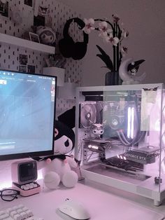 a desktop computer sitting on top of a white desk