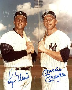 two baseball players are posing for a photo