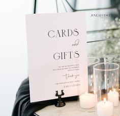 a table with candles and cards on it