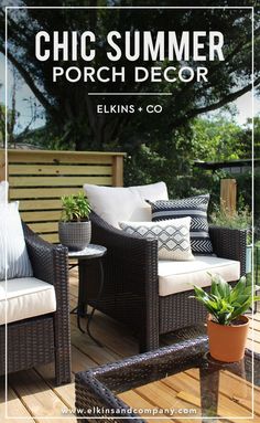 an outdoor patio with wicker furniture and potted plants on the decking area