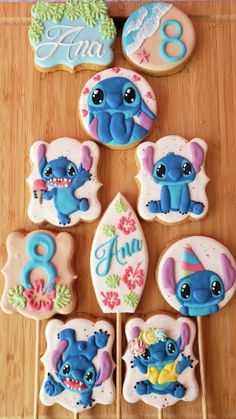 some cookies that are sitting on top of a wooden table with the numbers eight and nine