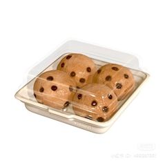 four chocolate chip muffins in a plastic container