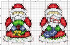 two cross stitch christmas stockings with santa clause on them