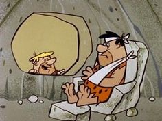 a cartoon character is looking at himself in the mirror while another person watches from behind him