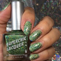 Charmed Holographic Nail Polish - 15 mL / 0.5 Fl. Oz. Bottle Charmed holographic nail polish is an incredibly eye-catching intense lime green holo packed polish featuring a gorgeous combination of teal holographic micro-flakies, lime green holo micro-glitter and a hint of linear holographic effects in a clear base. Apply 1 coat, sponge or dab over any complimenting Magic Mood or base colour as a topper or apply 2-3 coats on it's own for maximum intensity and full opacity! For best results apply Pet Poems, Beautiful Nail Polish, Holographic Nail Polish, Bottle Charms, Indie Nail Polish, Nail Art Supplies, Nail Polish Collection, Holographic Nails, Nail Decorations