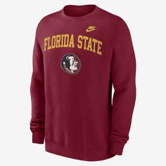 The Legacy Classic Arch Over Logo Crew brings a classic Florida State Seminoles look to fans’ wardrobes. It features a soft brushed French terry lining for warmth and throwback team details for a vintage aesthetic. Nike Collegiate Long Sleeve Sweatshirt, Nike Collegiate Tops For Fall, Nike Collegiate Sweatshirt, Nike Collegiate Sweatshirt For Winter, Nike Sweatshirt With Ribbed Cuffs For College, Nike Cotton Sweater For Fall, Winter College Nike Tops, Nike Winter Sweater With Ribbed Cuffs, Nike Long Sleeve Sweatshirt For College