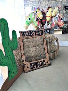 some hay and stuffed animals are on display