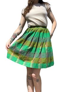 "Vintage 1950's Green Plaid Wool Pleated Skirt Adult XS size zipper and button Beautiful!! Union made In excellent vintage condition No stains or holes Tag reads Union made Measurements taken with skirt laid flat 11\" waist 21\" long Please look at measurements before purchasing to ensure a perfect fit. Vintage clothing tag sizes sometimes differ from modern sizes. I do my best to describe all stains and other imperfections as accurately as I can. Please reach out with any questions prior to pur Vintage Green Full Skirt Bottoms, Vintage Green Full Skirt, Wool Pleated Skirt, Shark Sweatshirt, Plaid Pleated Skirt, Clothing Tags, Union Made, Gap Denim, Denim Overalls