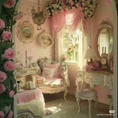 a room with pink walls and furniture in it