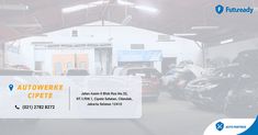 an auto repair shop with cars in the garage and on the floor, there is a large white sign that says autowerk cipete