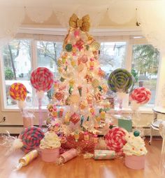 a christmas tree made out of lollipops and marshmallows