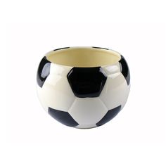 a black and white soccer ball shaped vase