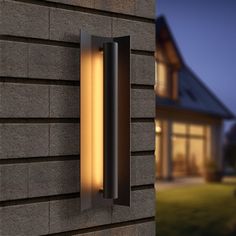 an outdoor light that is on the side of a building