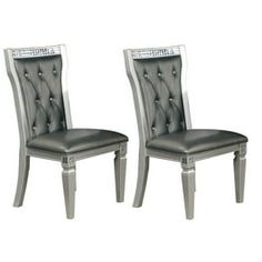 two silver chairs sitting side by side