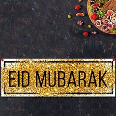 a sign that reads ed mubarak next to a plate of food