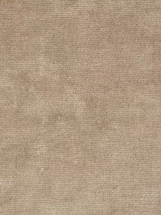 a beige fabric textured background that looks like it has been washed with some paint